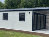 goosewing-grey-composite-garden-room-overhang